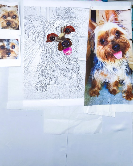 Reference photos beside a pencil sketch and partially completed fabric collage